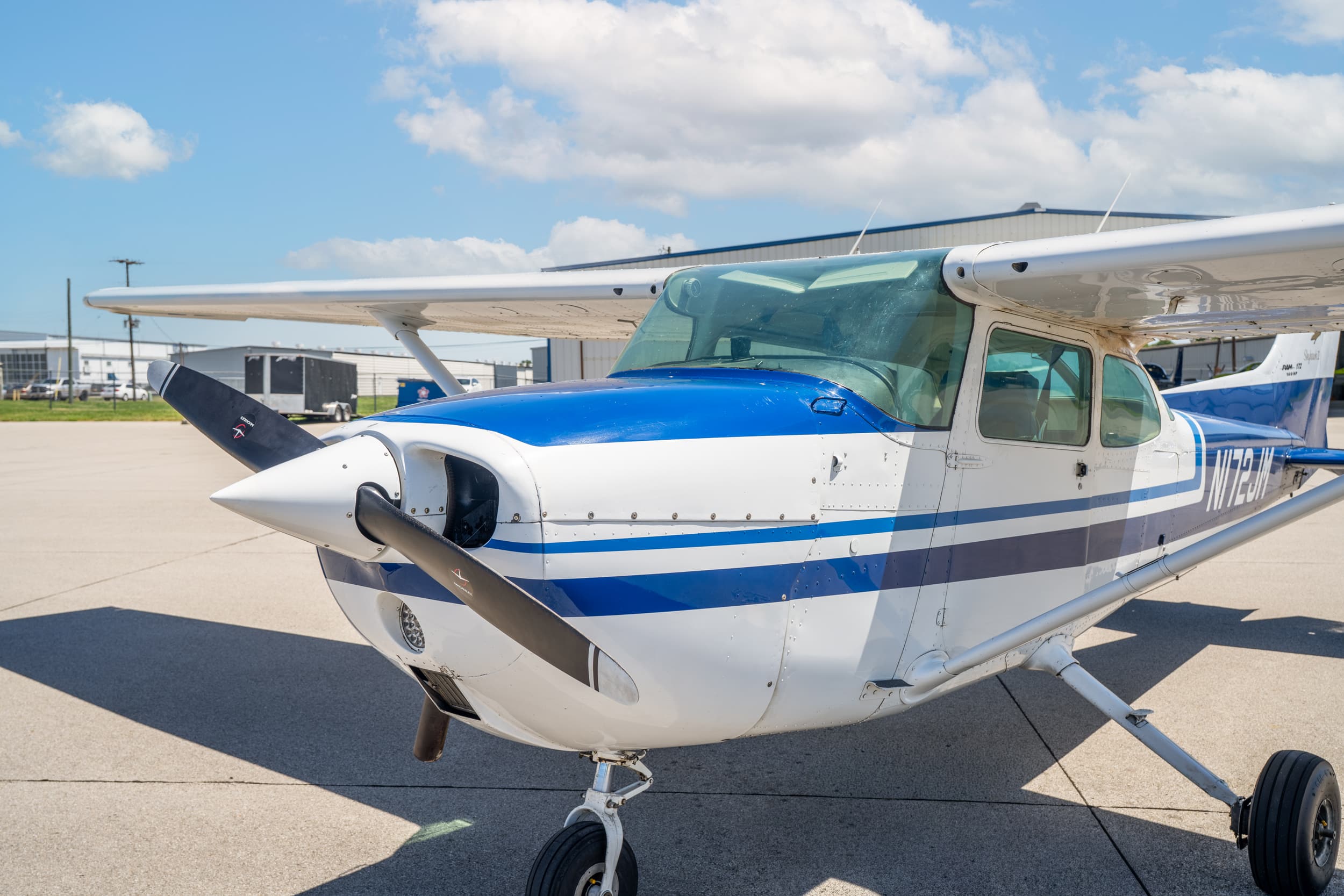 Cessna aircraft on runway at Bowman Field
