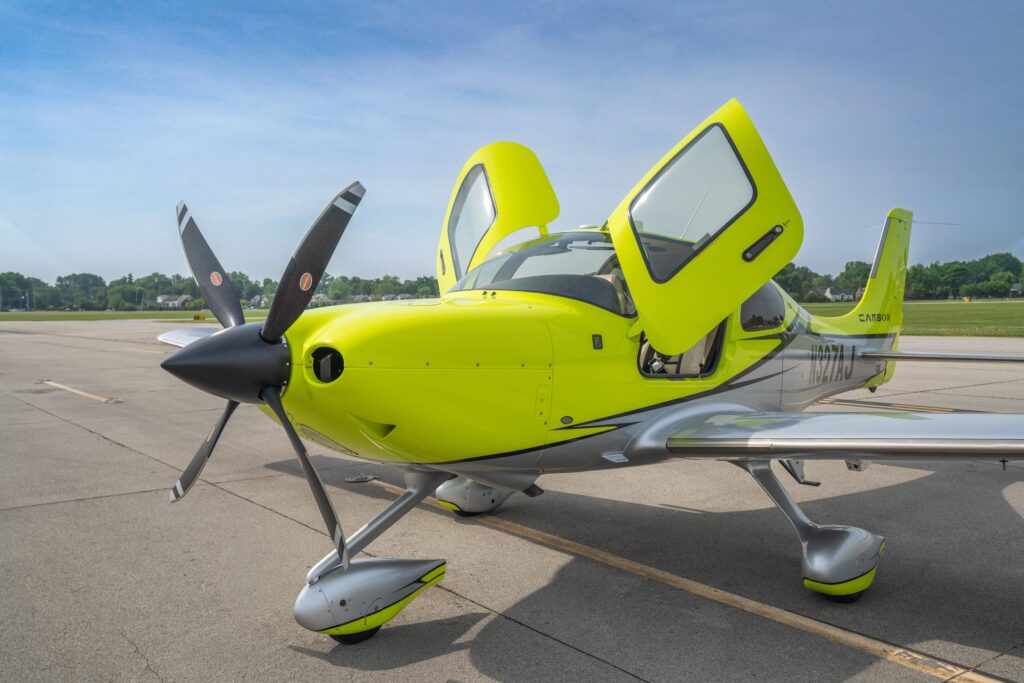 Cirrus SR22T G6 Carbon, tail number N327AJ, on the ramp at the historic Bowman Field in Louisville, Kentucky